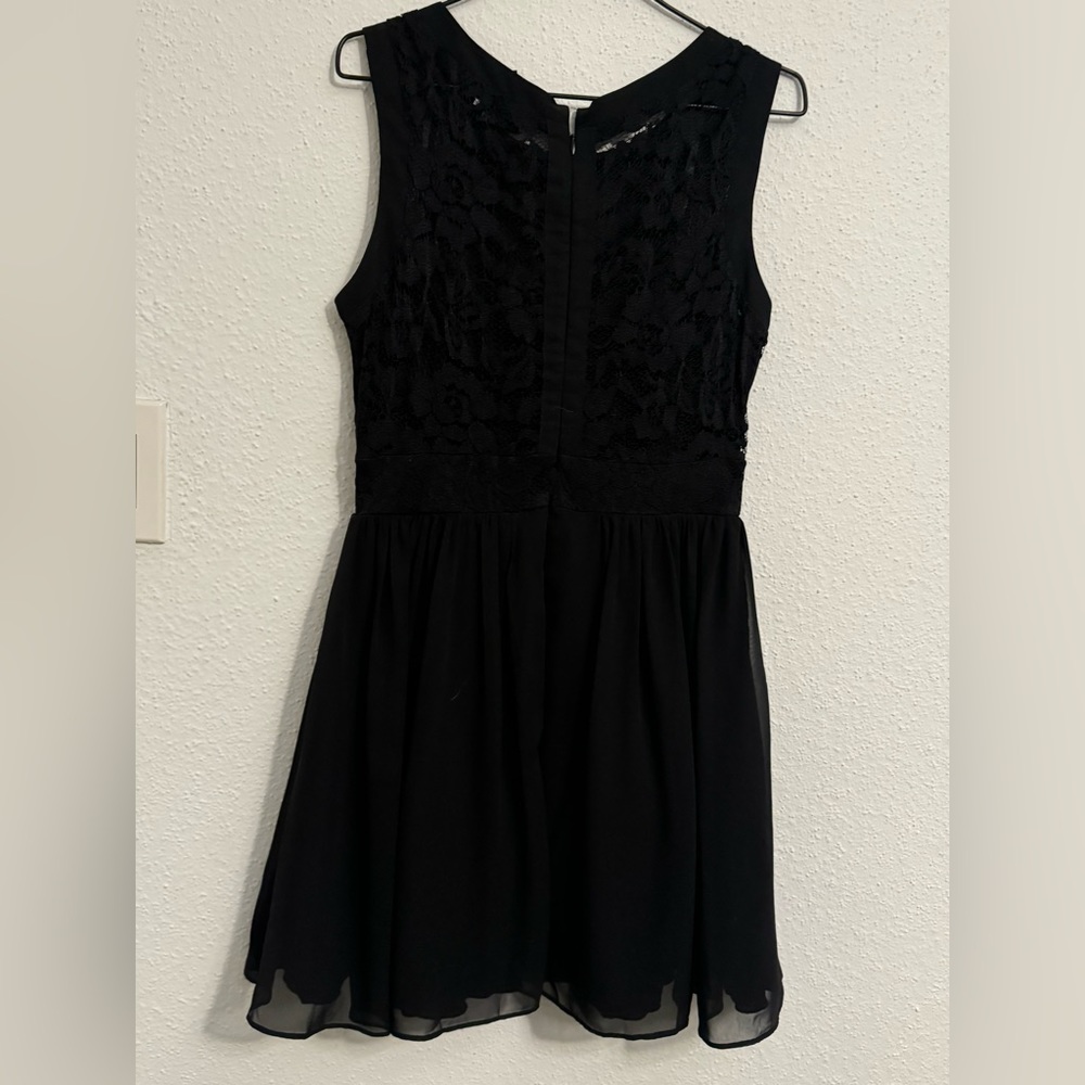 Juniors black homecoming dress with lace down the back